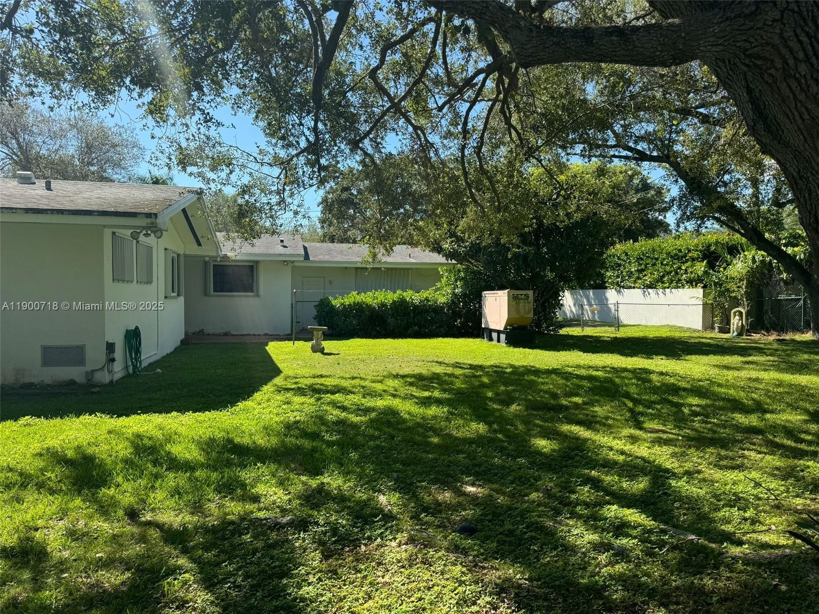 5345 Southwest 84th Street Miami, FL 33143 - Photo 13 of 15 a view of a house with a yard