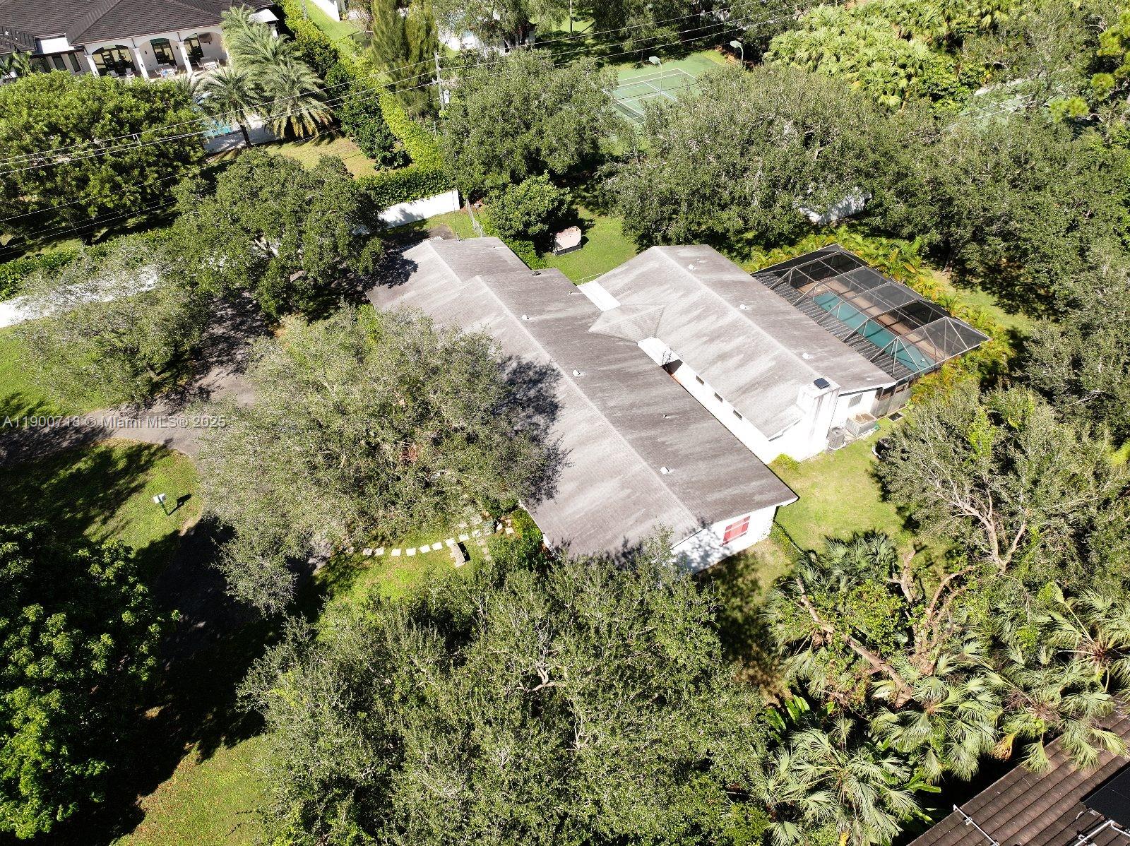 5345 Southwest 84th Street Miami, FL 33143 - Photo 5 of 15 a view of a garden with a pathway