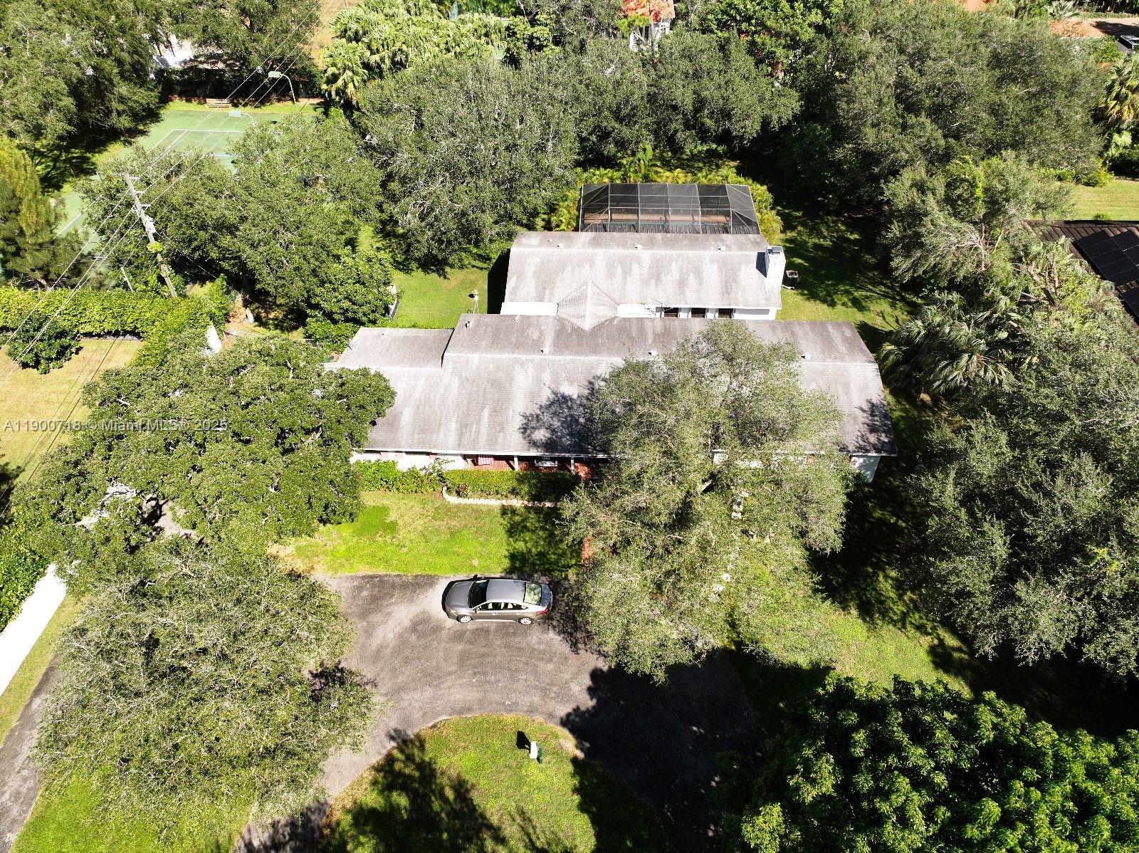 5345 Southwest 84th Street Miami, FL 33143 - Photo 6 of 15 an aerial view of a house with a yard