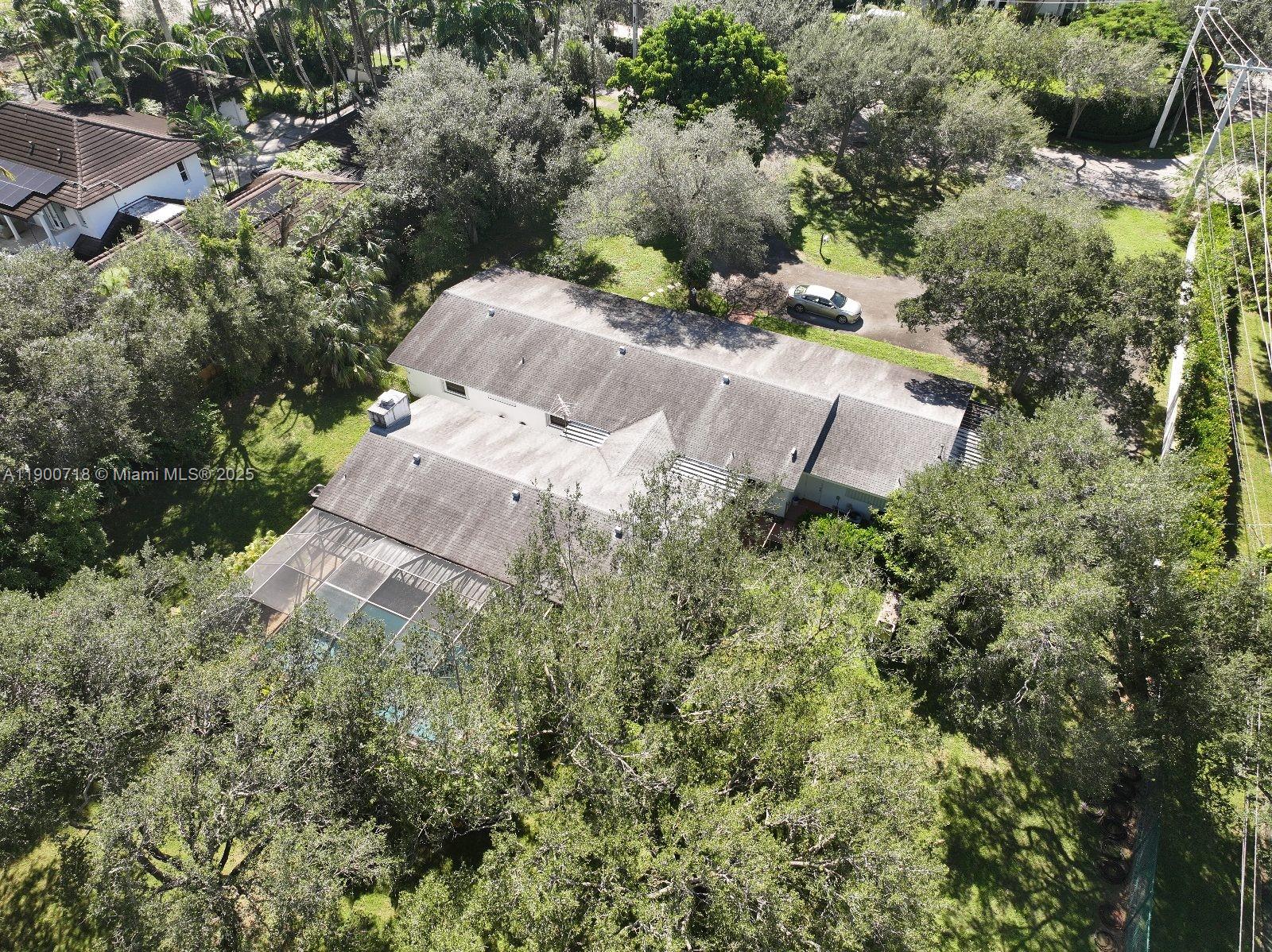 5345 Southwest 84th Street Miami, FL 33143 - Photo 10 of 15 an aerial view of residential house with outdoor space and trees all around