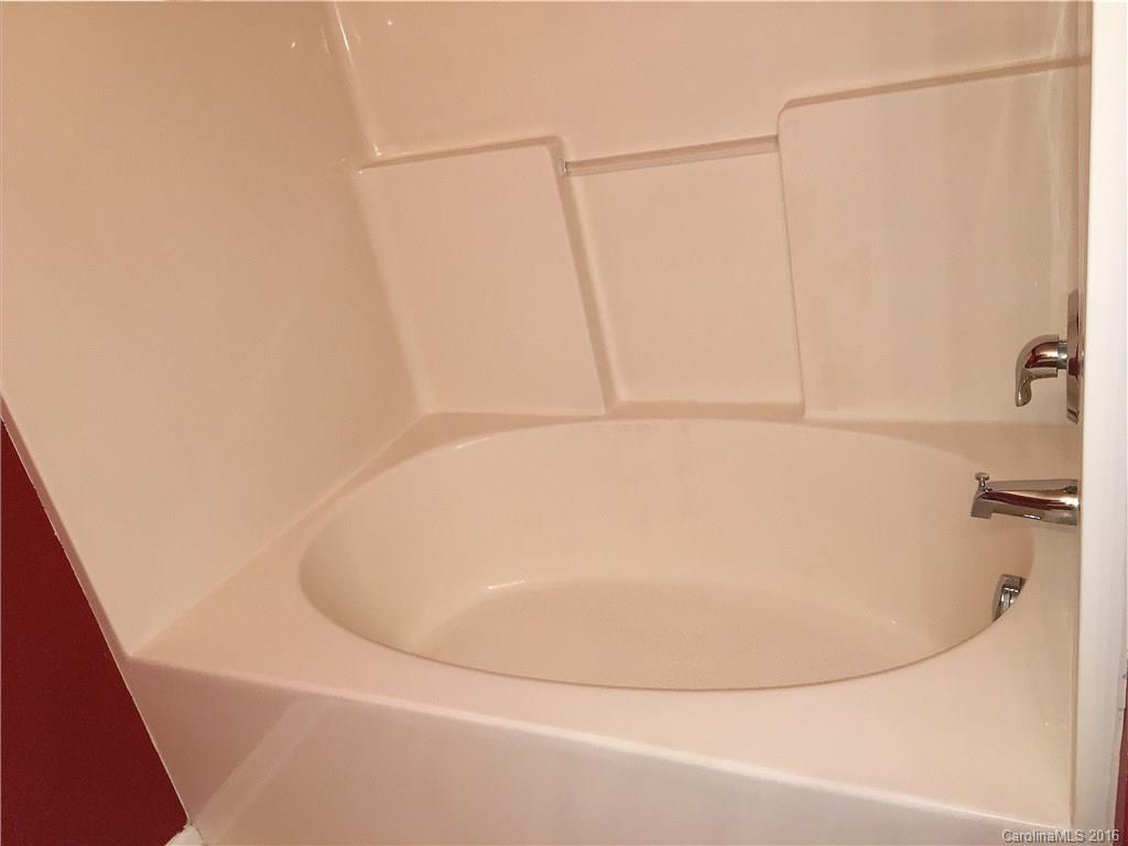 3062 Priory Ridge Drive Fort Mill, SC 29707 - Photo 17 of 24 a white bath tub sitting in a bathroom