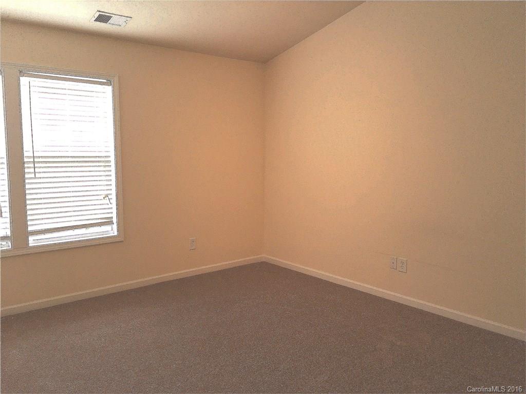 3062 Priory Ridge Drive Fort Mill, SC 29707 - Photo 18 of 24 an empty room with a window