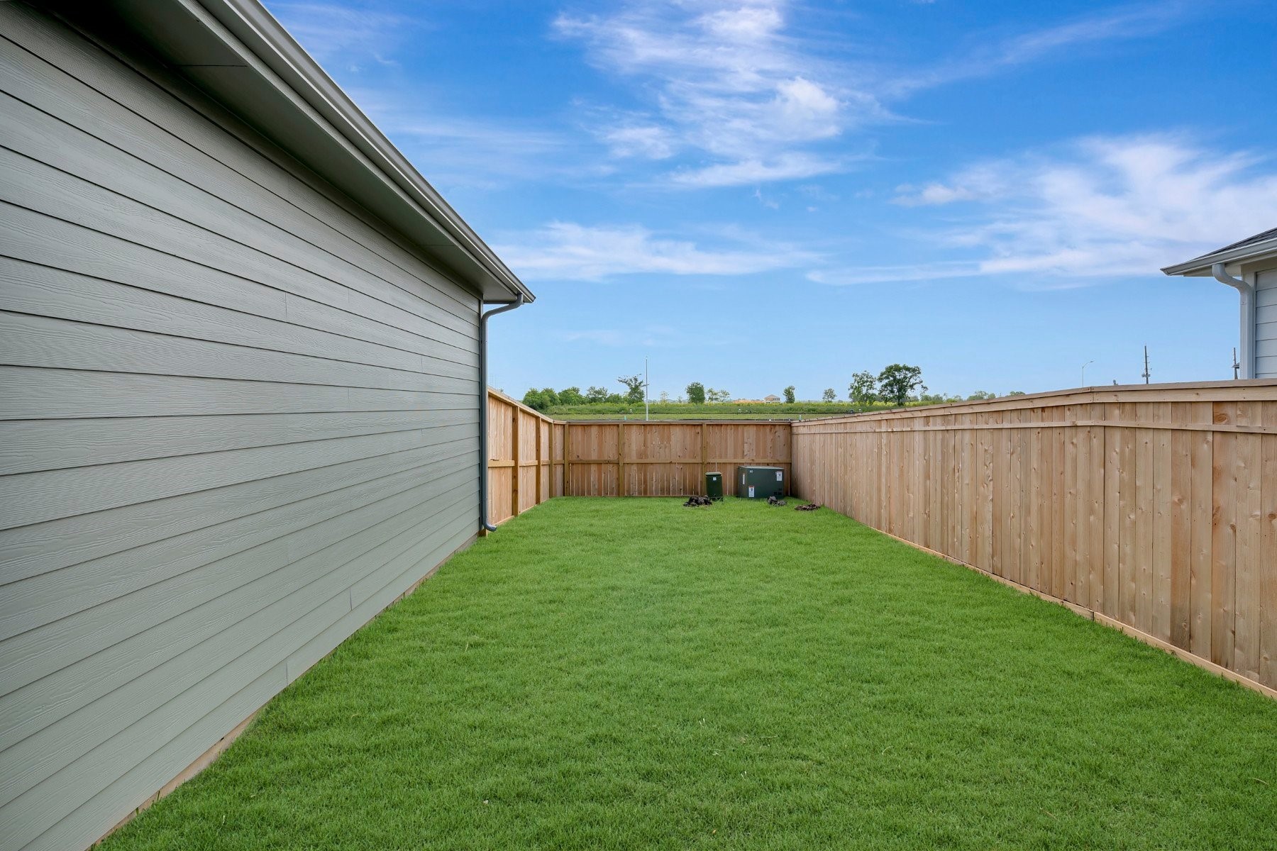 2722 Cottage Place Rosharon, TX 77583 - Photo 7 of 50 a view of backyard with wooden fence