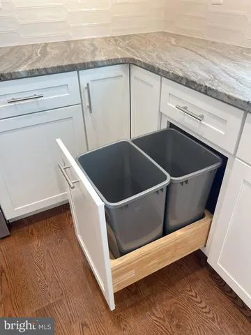 a view of a hallway with a window