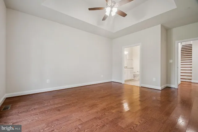 a view of a living room with a floor to ceiling window