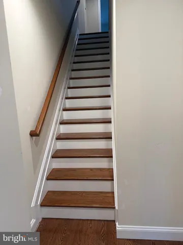 a view of yard with swimming pool and green space