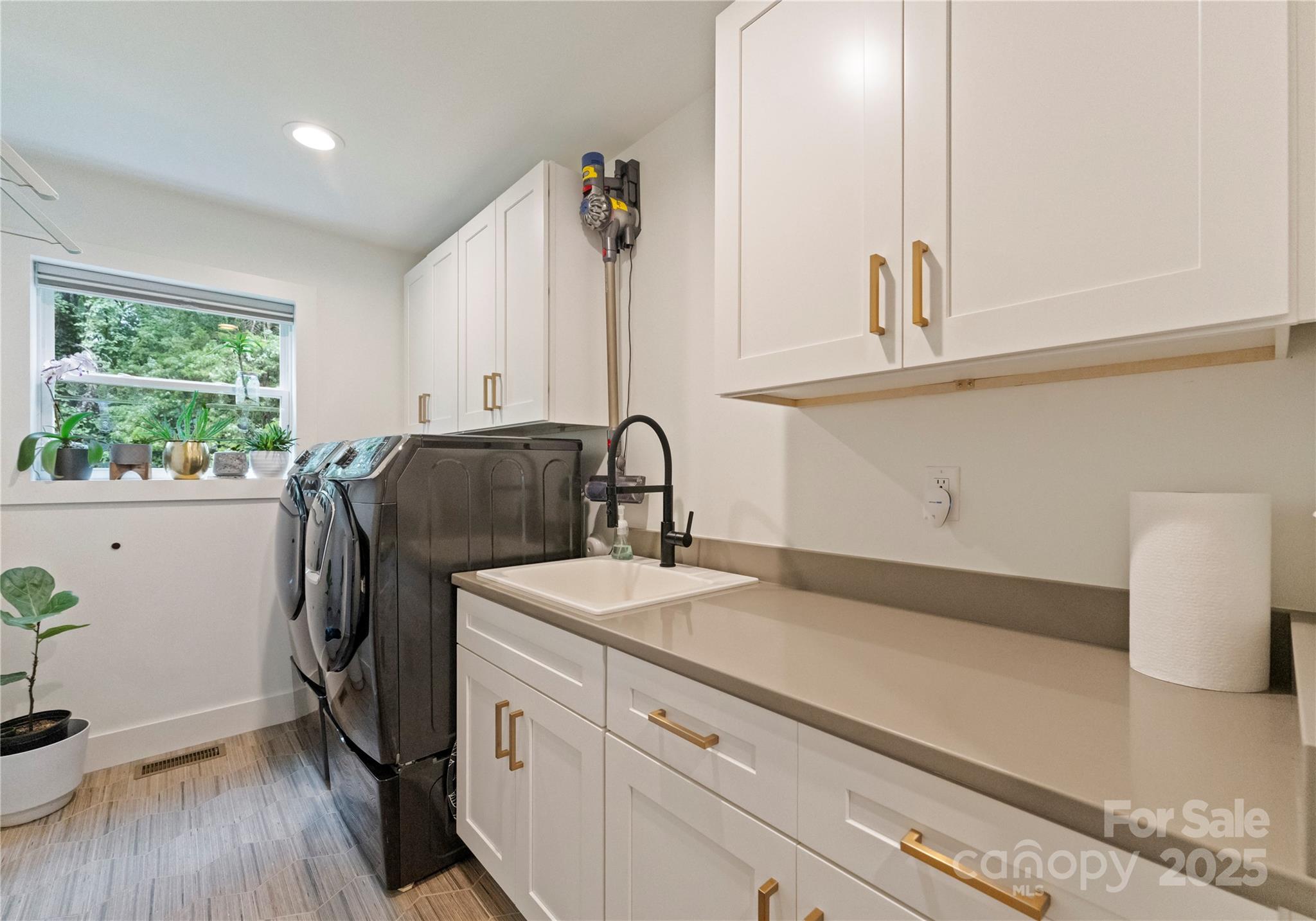 6527 Burlwood Road Charlotte, NC 28211 - Photo 27 of 43 a view of living room with furniture and floor to ceiling window