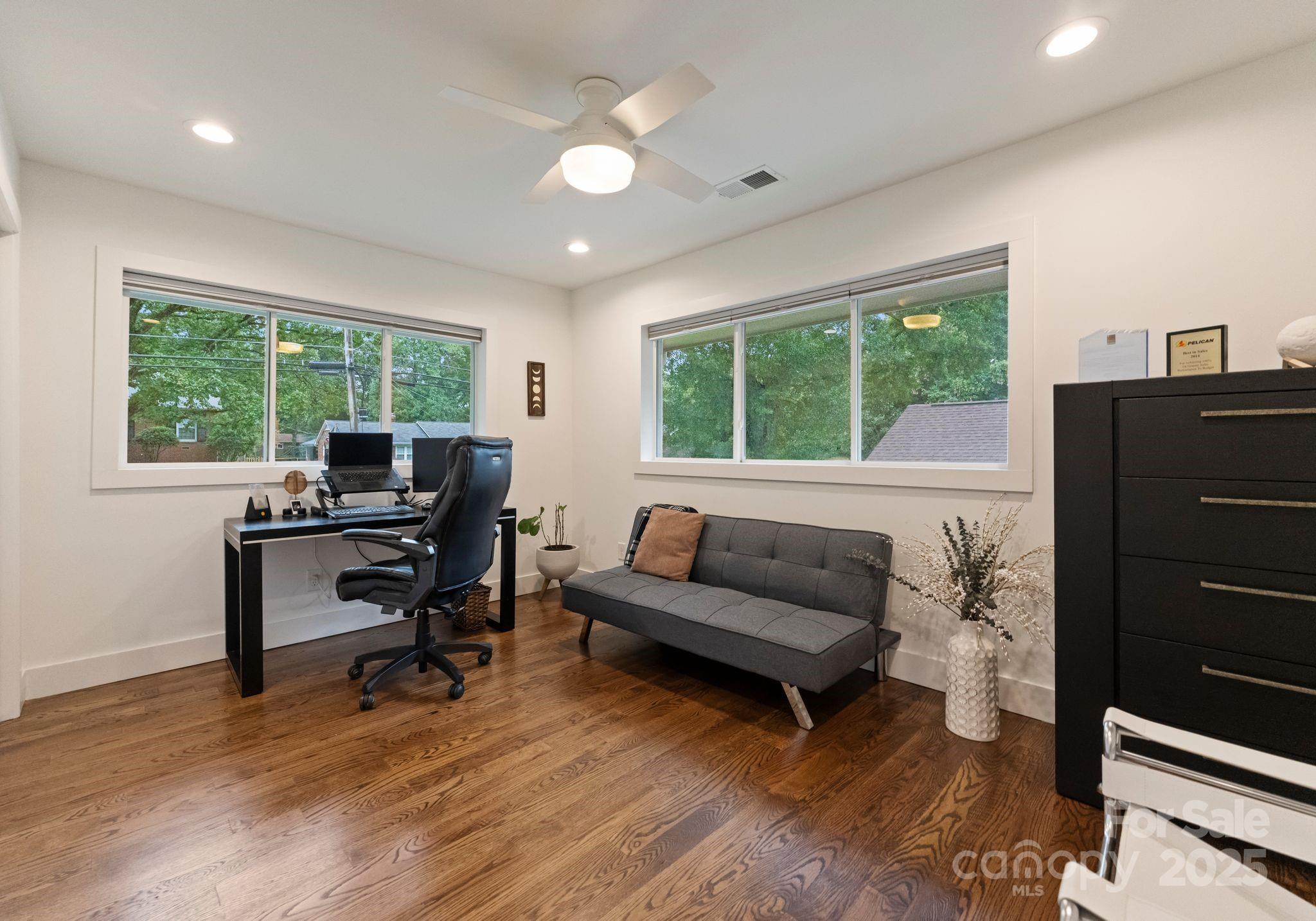 6527 Burlwood Road Charlotte, NC 28211 - Photo 31 of 43 a living room with furniture and a window