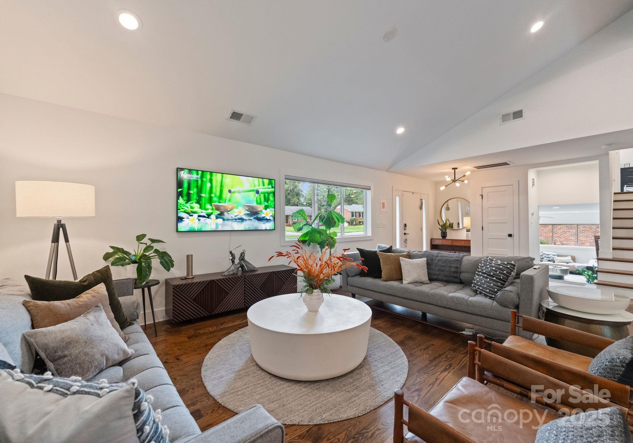 6527 Burlwood Road Charlotte, NC 28211 - Photo 5 of 43 a living room with furniture and a large window