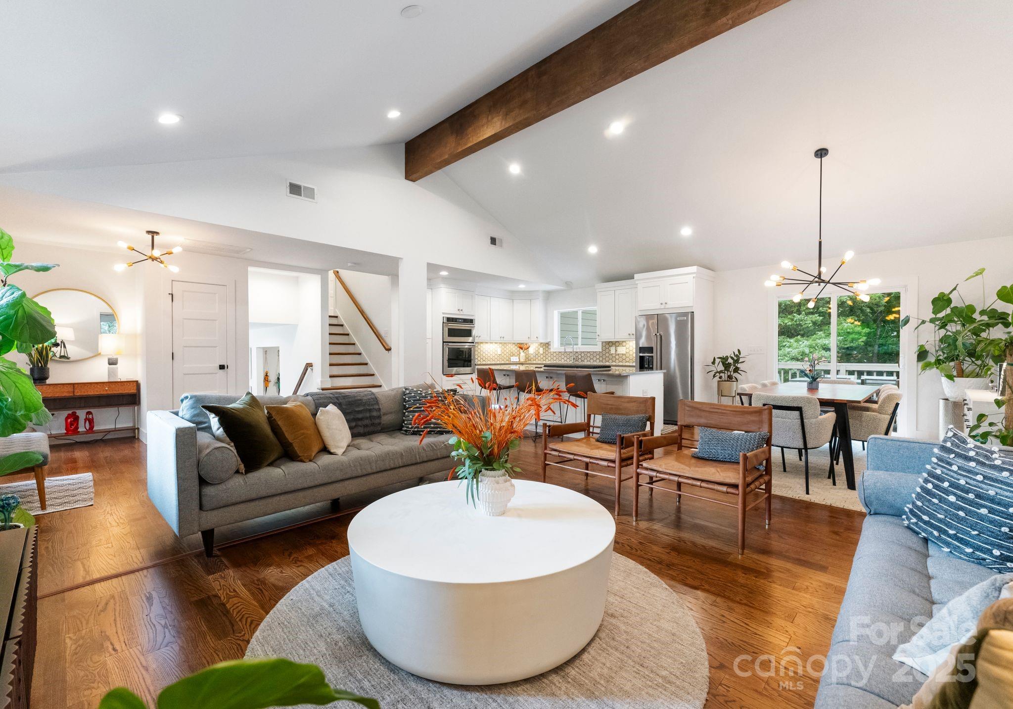 6527 Burlwood Road Charlotte, NC 28211 - Photo 6 of 43 a living room with furniture and a large window