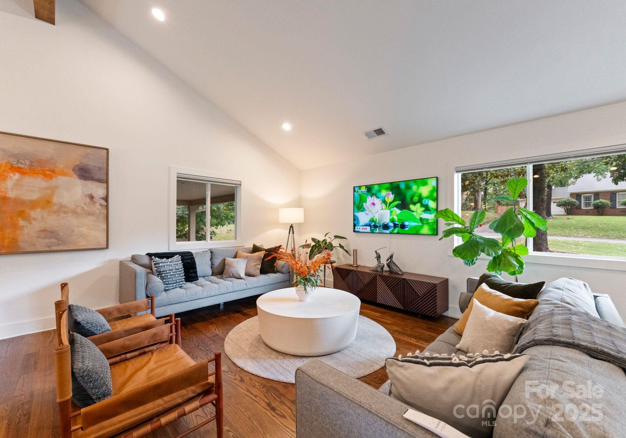 6527 Burlwood Road Charlotte, NC 28211 - Photo 7 of 43 a living room with furniture and a large window