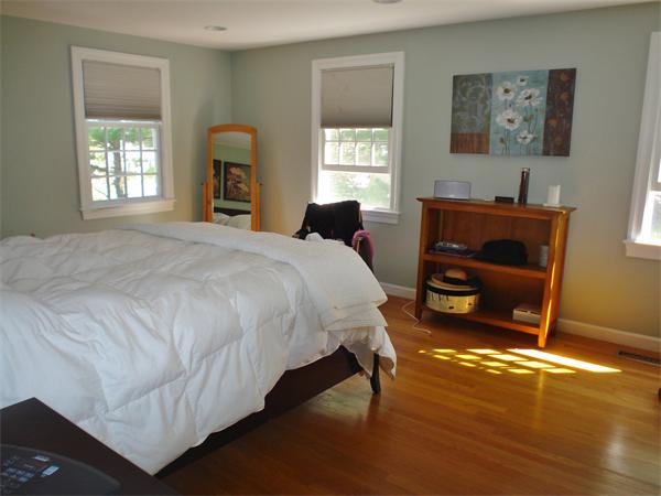 88 Jericho Road, Unit 88 Weston, MA 02493 - Photo 5 of 8 a bedroom with a bed and a window
