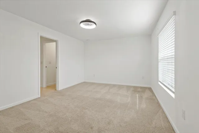 an empty room with windows