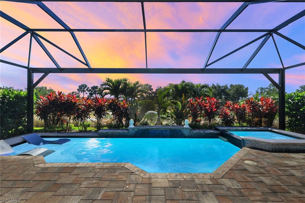 8935 Cappello Court Naples, FL 34119 - Photo 26 of 50 a view of a backyard