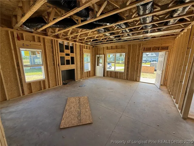 a view of hallway with windows