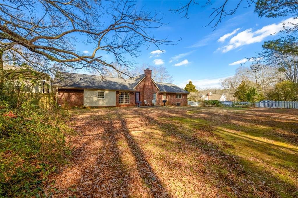 4304 Riverside Drive Southwest Lilburn, GA 30047 - Photo 32 of 33 a house view with a outdoor space