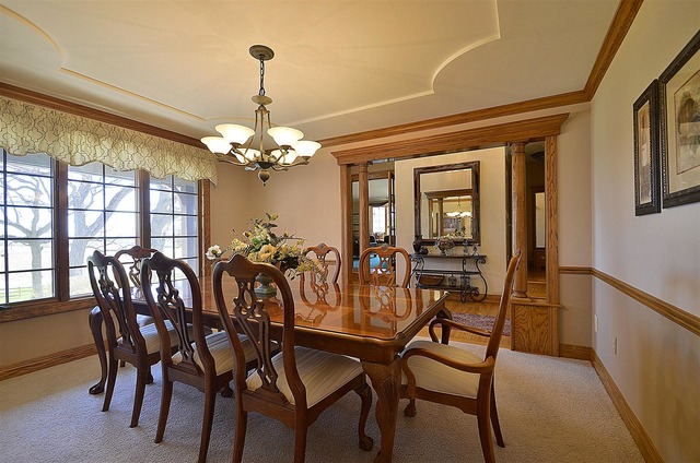 6-n034 Corron Road St. Charles, IL 60175 - Photo 6 of 25 a view of a dining room with furniture and a chandelier