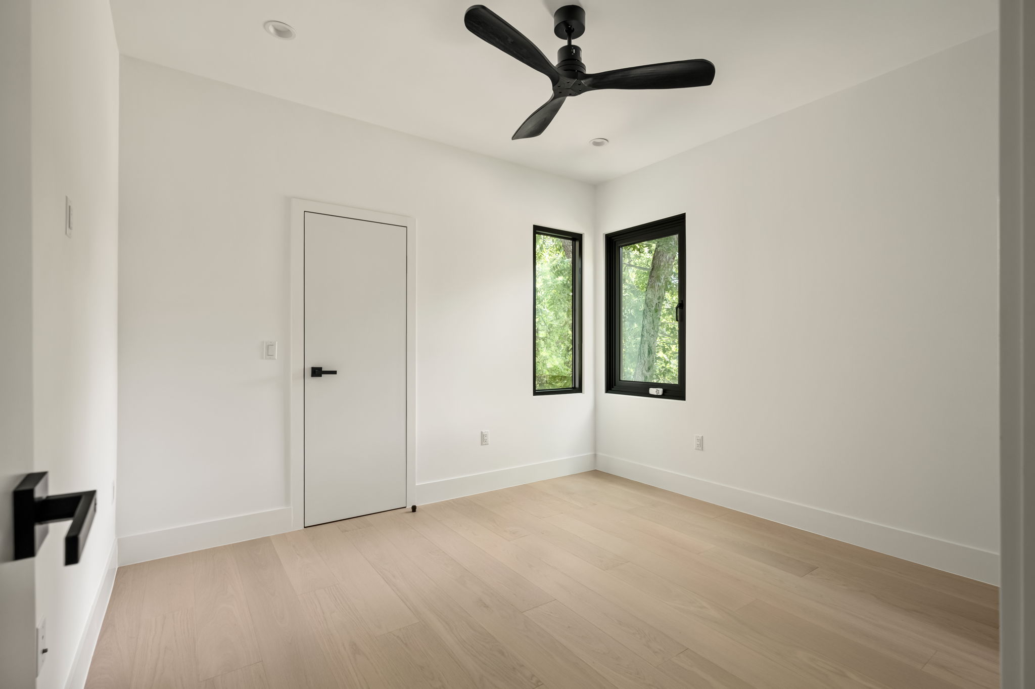 3210 Thompson Street Austin, TX 78702 - Photo 26 of 39 Hardwood floors and generous windows characterize this inviting, luminous space.