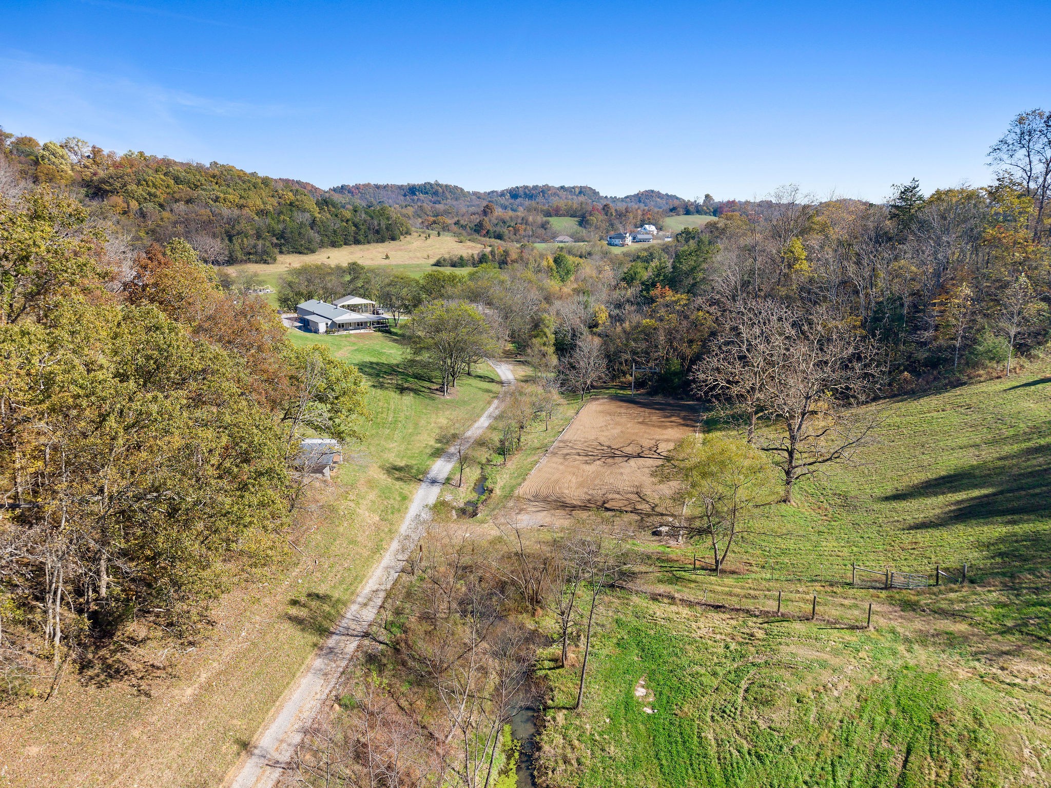 183 Puncheon Camp Lane Bell Buckle, TN 37020 - Photo 32 of 51 a view of a lake with a mountain in the background