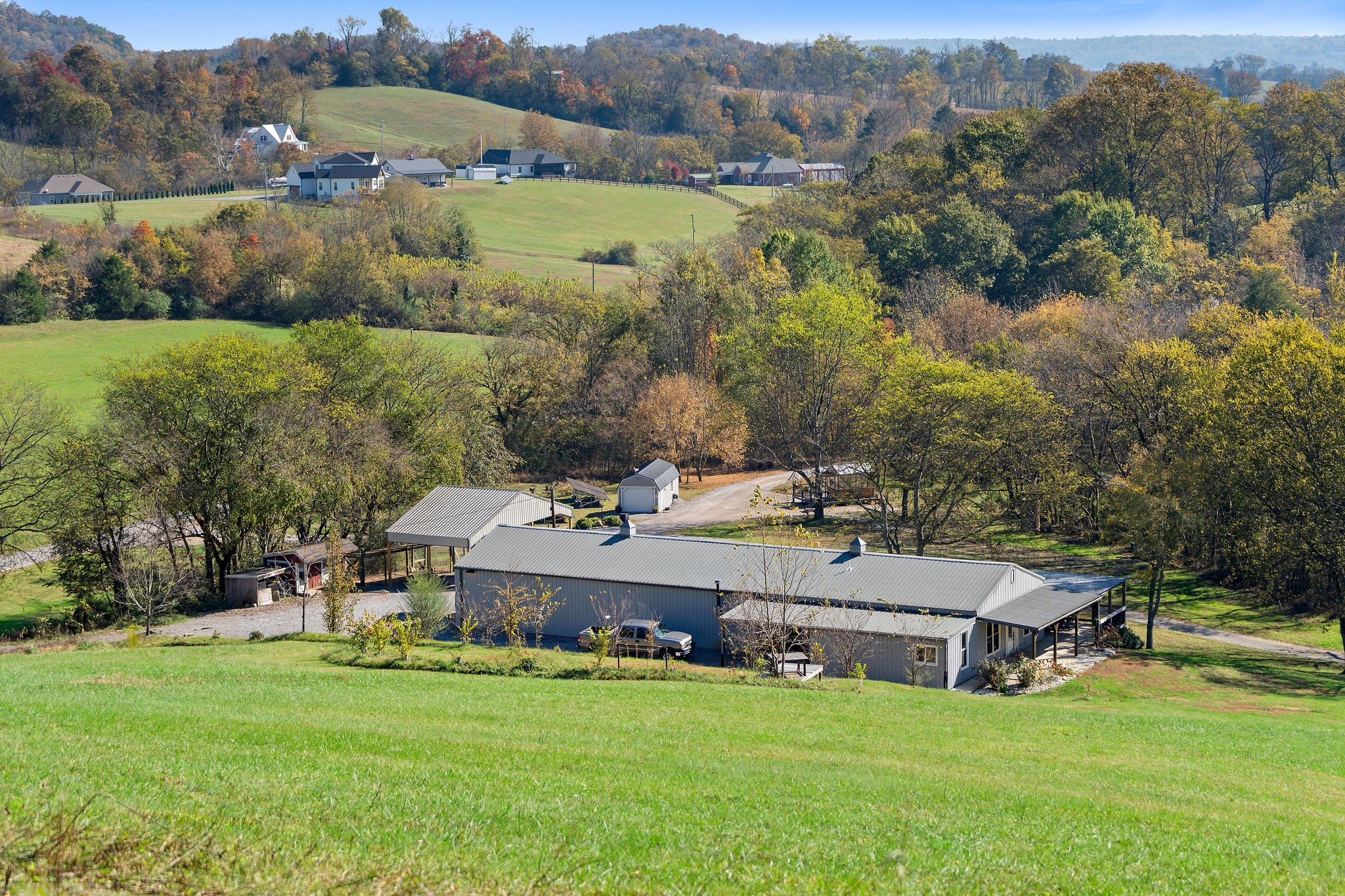 183 Puncheon Camp Lane Bell Buckle, TN 37020 - Photo 51 of 51 an aerial view of residential houses with outdoor space and trees