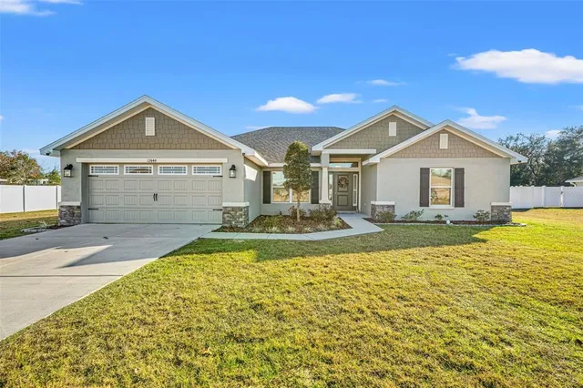$430,000 | 12444 Sunset Woods Drive, Spring Hill, FL 34609