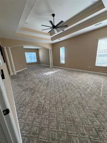 a view of a livingroom with a staircase