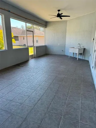 an empty room with windows