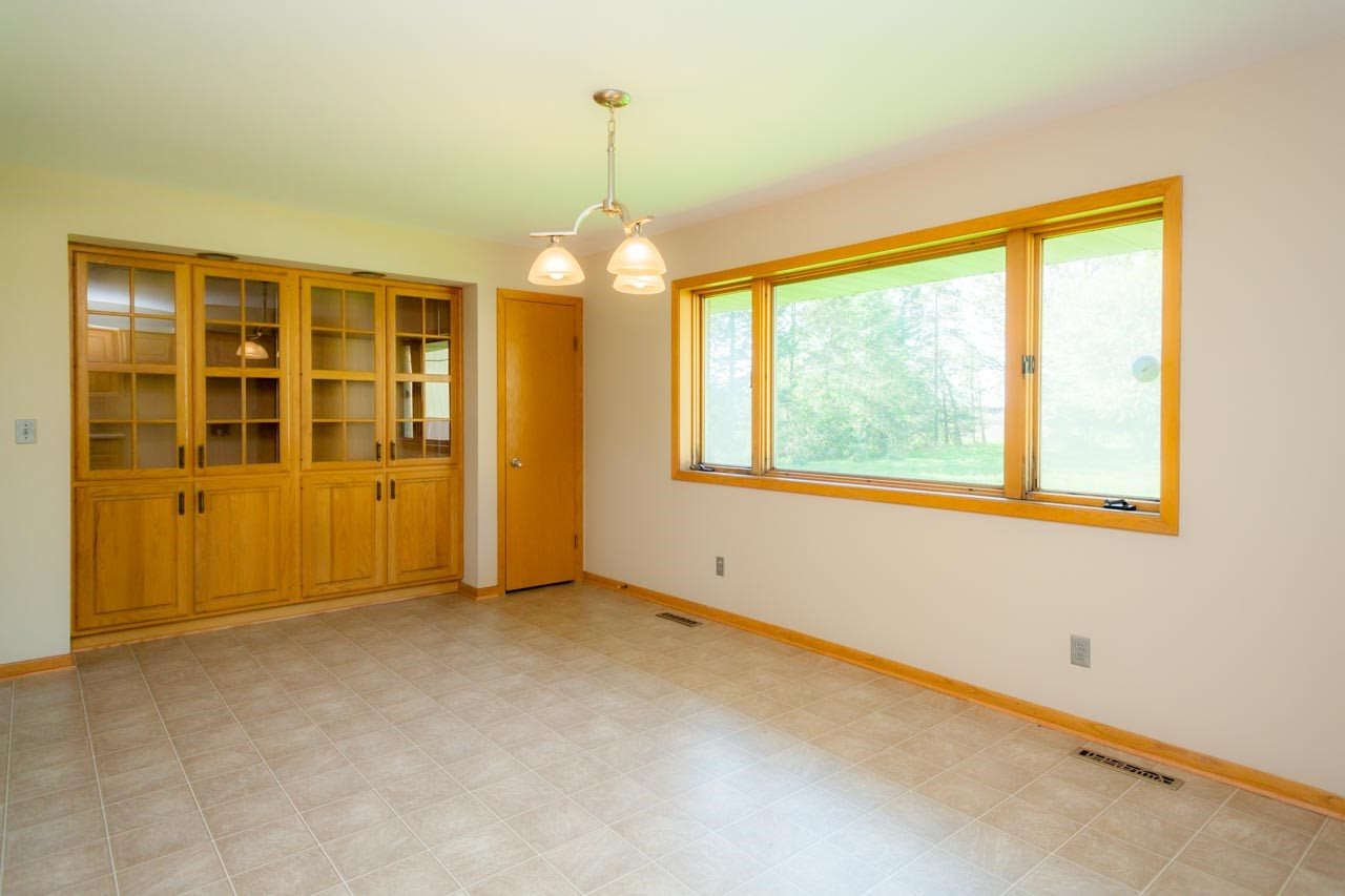18660 Burr Oak Road Capron, IL 61012 - Photo 11 of 25 a view of an empty room with a window