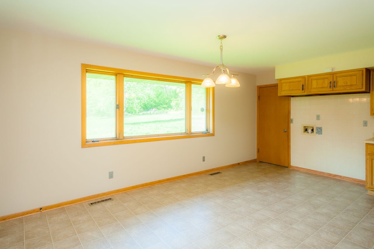 18660 Burr Oak Road Capron, IL 61012 - Photo 12 of 25 a view of an empty room with a window