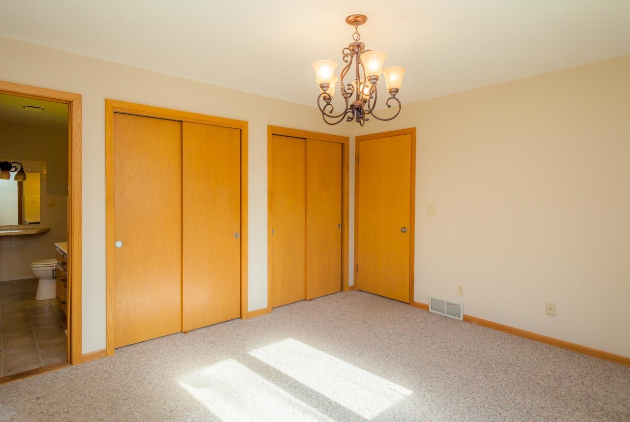 18660 Burr Oak Road Capron, IL 61012 - Photo 13 of 25 a view of a big room with a chandelier