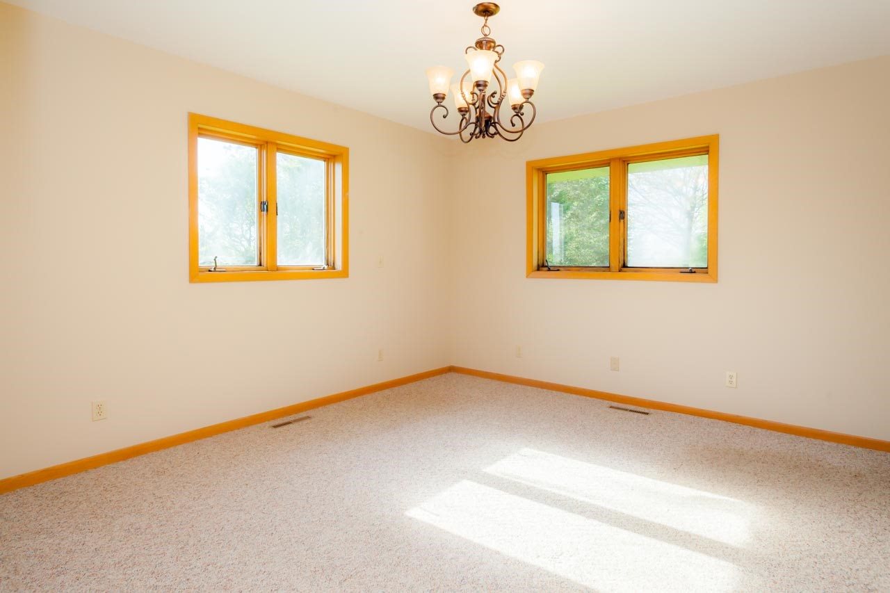 18660 Burr Oak Road Capron, IL 61012 - Photo 14 of 25 en empty room with windows