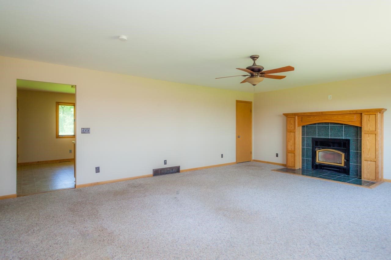 18660 Burr Oak Road Capron, IL 61012 - Photo 8 of 25 a view of empty room with a fireplace