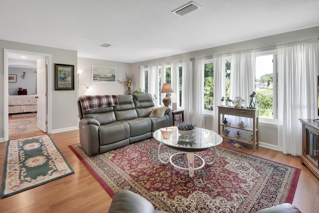 50 Bonita Road DeBary, FL 32713 - Photo 11 of 43 a living room with furniture and a window