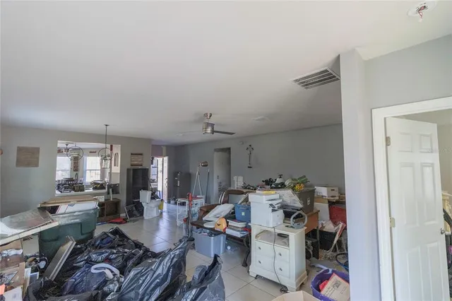 a bed room with furniture and a window