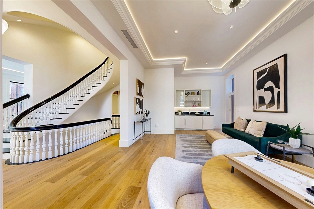 57 Hancock Street Boston, MA 02114 - Photo 15 of 42 a living room with furniture and wooden floor