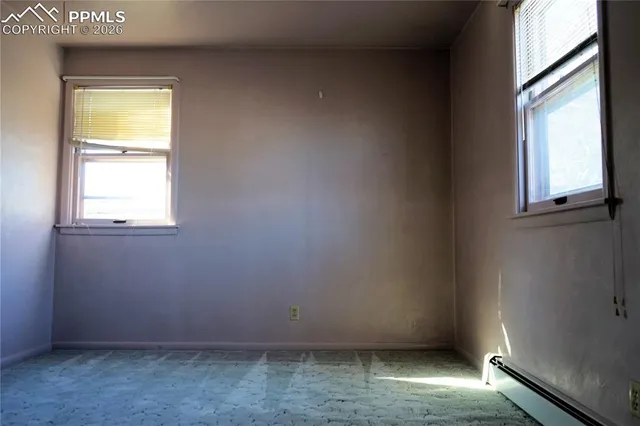 an empty room with a window