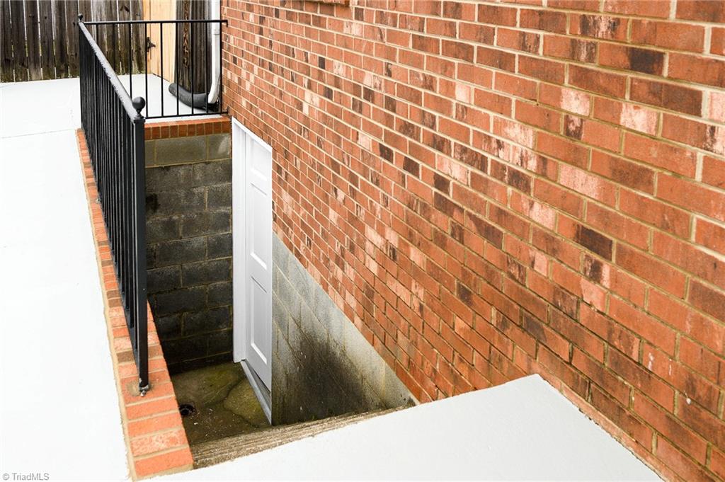 211 Rowe Road Lexington, NC 27295 - Photo 5 of 32 Small unfinished basement entrance.