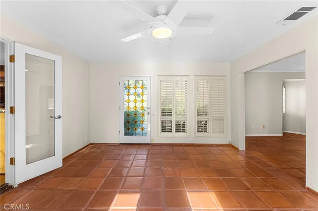 a spacious bathroom with a double vanity sink a mirror and shower