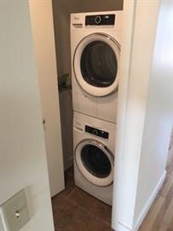 296 Meridian Street, Unit 1 Boston, MA 02128 - Photo 4 of 9 a utility room with dryer and washer