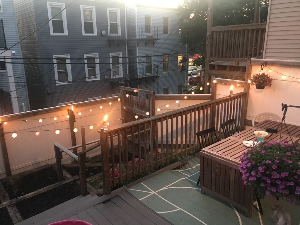 296 Meridian Street, Unit 1 Boston, MA 02128 - Photo 8 of 9 a view of balcony with furniture