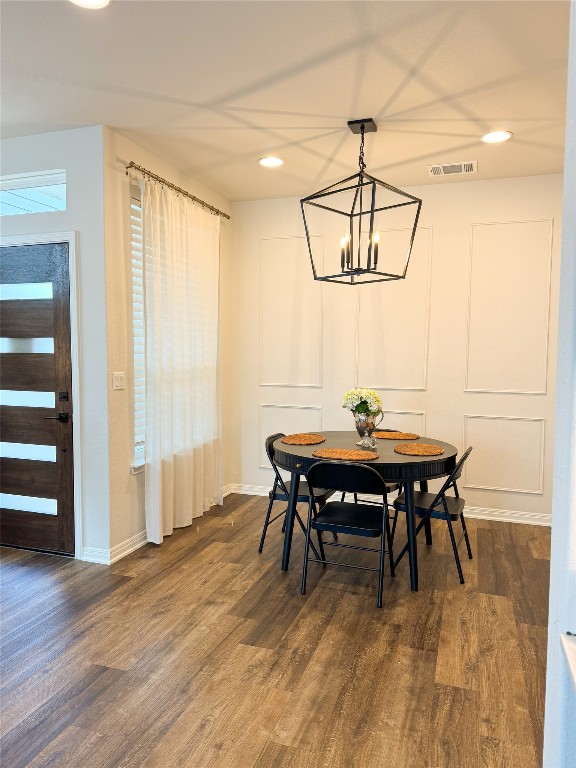 144 Alexander Kyle, TX 78640 - Photo 6 of 11 a view of a dining room with furniture window and wooden floor