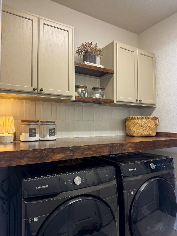 144 Alexander Kyle, TX 78640 - Photo 9 of 11 a kitchen with a sink a stove and cabinets