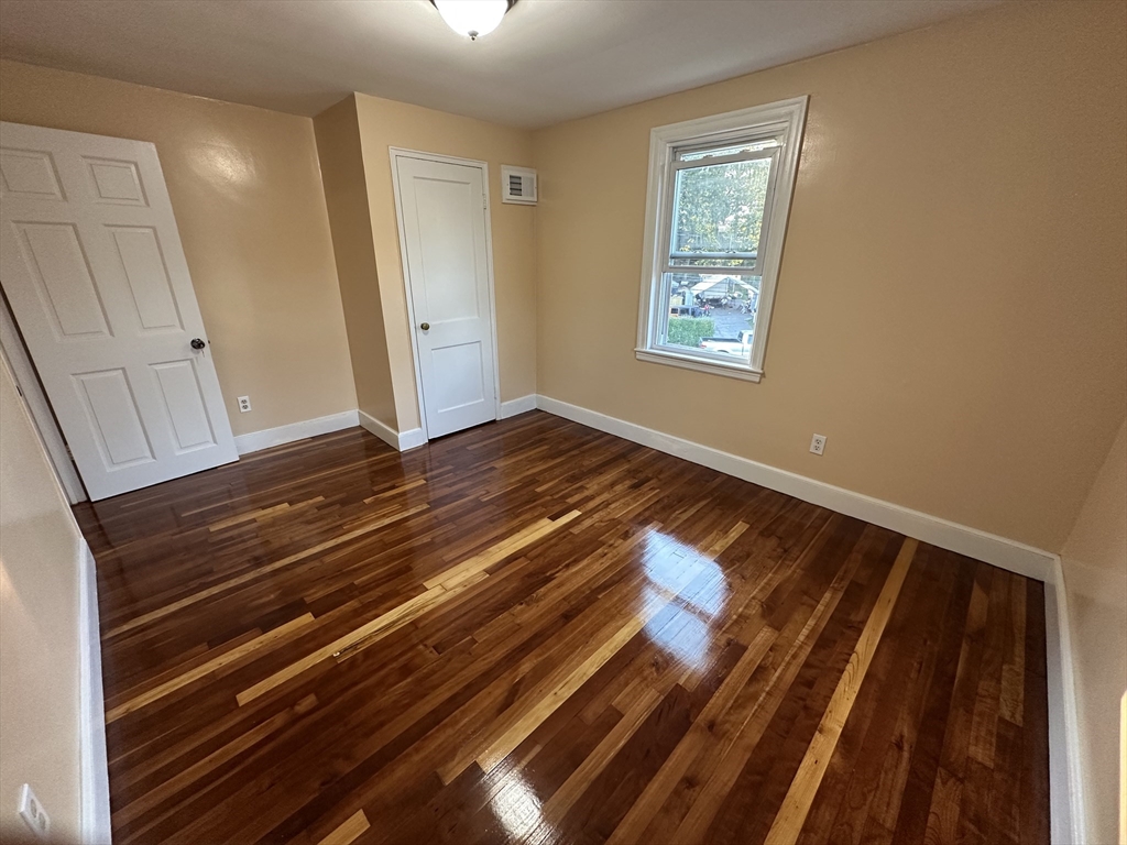 3 Arborcrest Terrace, Unit 2 Boston, MA 02126 - Photo 28 of 29 a view of wooden floor