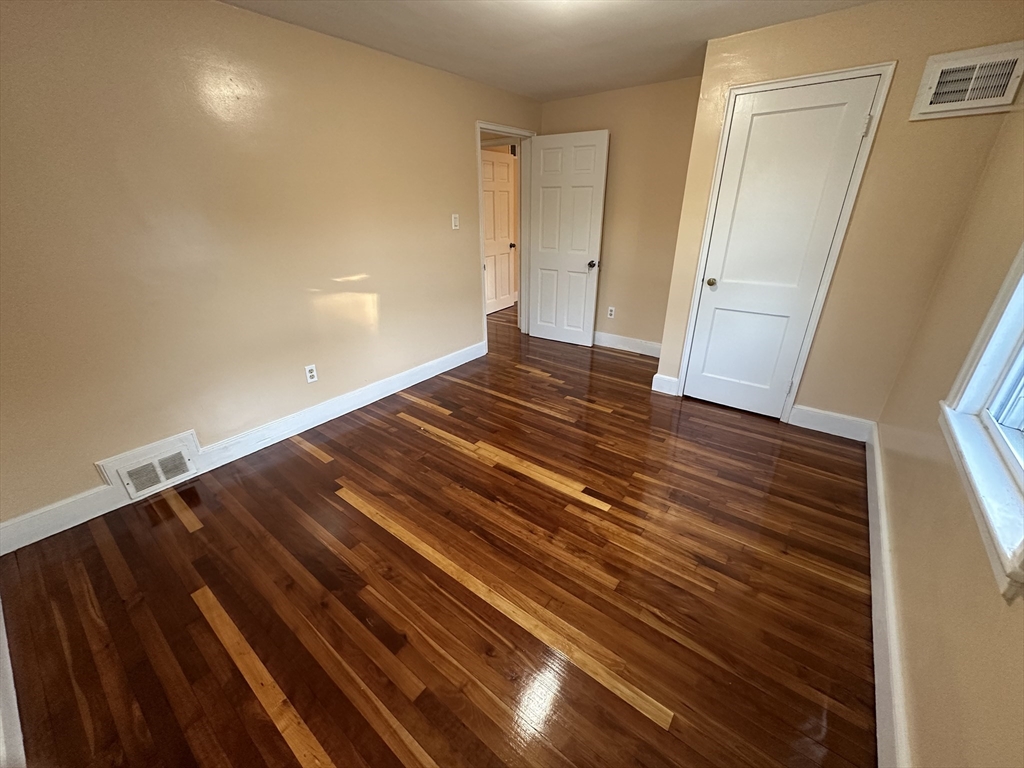 3 Arborcrest Terrace, Unit 2 Boston, MA 02126 - Photo 29 of 29 a view of wooden floor
