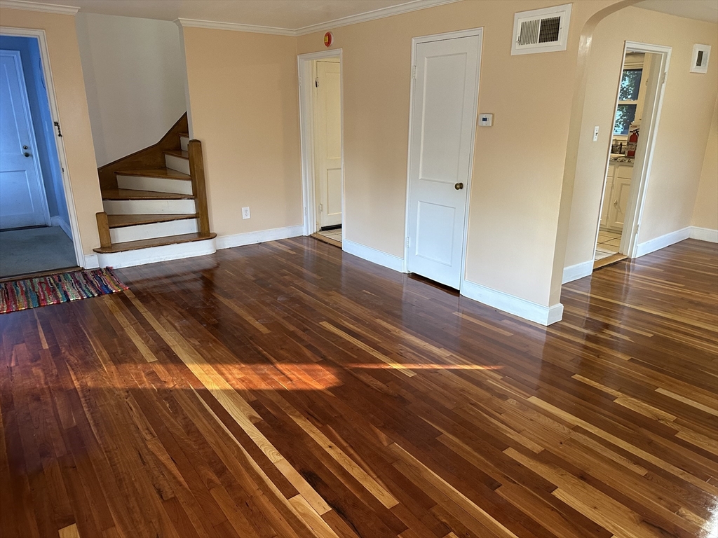 3 Arborcrest Terrace, Unit 2 Boston, MA 02126 - Photo 10 of 29 a view of wooden floor