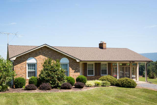 2408 River Road New Market, VA 22844 - Photo 1 of 16 a front view of a house with garden