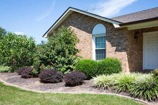2408 River Road New Market, VA 22844 - Photo 2 of 16 a front view of a house with a yard garage and outdoor seating