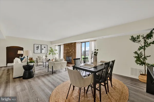 a view of a livingroom with furniture and window
