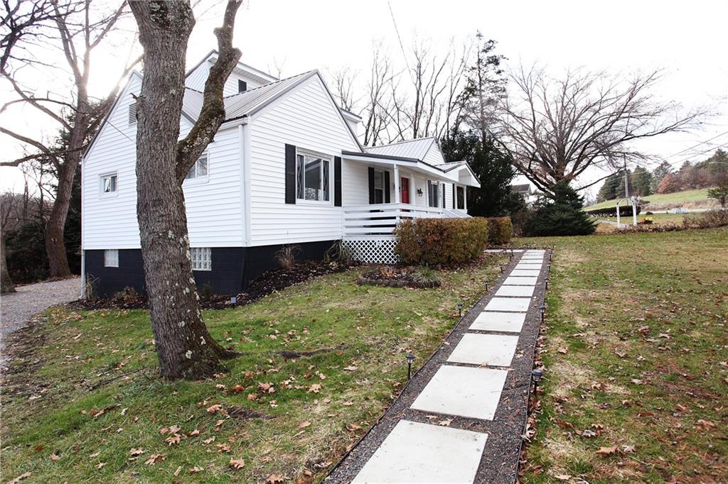 46 Michael Road Russellton, PA 15076 - Photo 2 of 25 a front view of a house with a yard