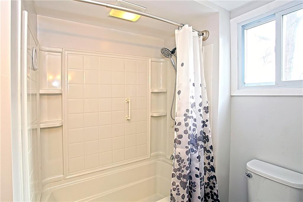 46 Michael Road Russellton, PA 15076 - Photo 18 of 25 a bathroom with a shower curtain and a window